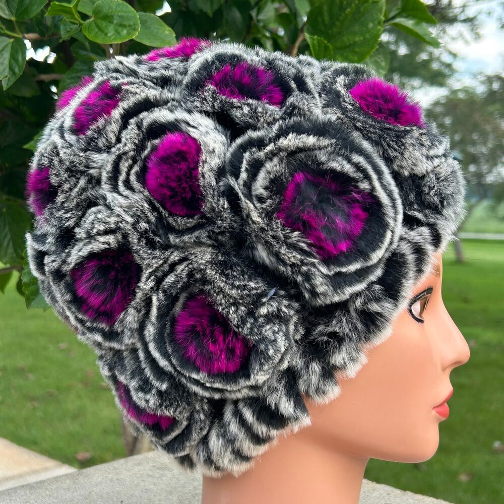 Knitted rex rabbit fur beanie hat textured rose/floral 
Magenta, black and white